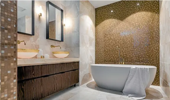  ??  ?? This glamorous suite by Davinia Sutton won the TIDA Designer Bathroom award. It was designed to reference the owners’ Indian heritage.