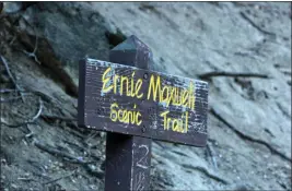  ?? PHOTO BY STEVE LECH ?? A sign is seen at the beginning of the Ernie Maxwell Scenic Trail, which as named for a man who was influentia­l in the Idyllwild area for decades.