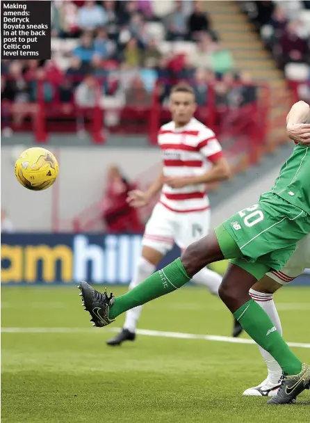  ??  ?? Making amends: Dedryck Boyata sneaks in at the back post to put Celtic on level terms