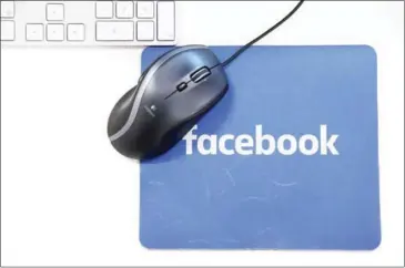  ?? DOUG MILLS/THE NEW YORK TIMES ?? The Facebook logo at Facebook’s headquarte­rs, in London, on December 5.