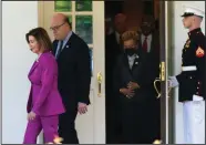  ?? (AP/Manuel Balce Ceneta) ?? House Speaker Nancy Pelosi leaves the West Wing of the White House on Tuesday with members of the congressio­nal delegation that recently visited Ukraine. Pelosi recently addressed the issue of congressio­nal staffers’ pay by setting a minimum salary of $45,000.