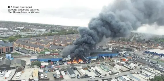  ??  ?? A large fire ripped through industrial units on Tan House Lane in Widnes