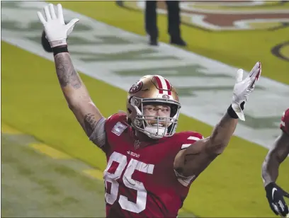  ?? TONY AVELAR — THE ASSOCIATED PRESS FILE ?? San Francisco 49ers tight end George Kittle (85) celebrates after scoring a touchdown against the Philadelph­ia Eagles during the second half in Santa Clara last Sunday, Oct. 4.