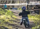  ?? ?? Left: A day was devoted to the stars of the future, with two to five-year-olds hitting the balance bike course.