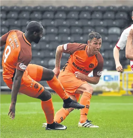  ?? Picture: SNS Group. ?? Scott McDonald pounces in front of substitute Patrick N’Koyi to scoop in United’s winner 10 minutes from time to break Brechin’s resistance.