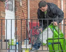  ??  ?? Mr. McIntosh drops off groceries on Tuesday via Instacart.