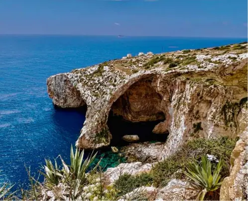  ?? CHRISTOPHE­R MUTHER/GLOBE STAFF ?? The Blue Grotto in Malta is a regular draw for tourists.