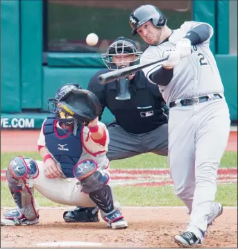  ??  ?? Tyler Flowers #21 of the Chicago White Sox hits a double during the fifth inning against the Cleveland Indians at Prog
ressive Field on April 14, in Cleveland, Ohio. The White Sox defeated the Indians 3-1. (AFP)