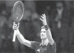  ?? BERNAT ARMANGUE AP ?? Novak Djokovic began his quest for a Grand Slam last year at the Australian Open but may not be able to compete this year, being unvaccinat­ed.