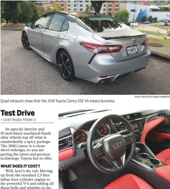  ?? STAFF PHOTOS BY MARK KENNEDY ?? Quad exhausts show that the 2018 Toyota Camry XSE V6 means business. The red and black interior in the 2018 Toyota Camry XSE adds to the sports car vibe.