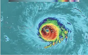  ?? WILLIAM STRAKA III, NASA/NOAA/UWM-CIMSS ?? Hurricane Irma passes over the island of Barbuda on Wednesday.