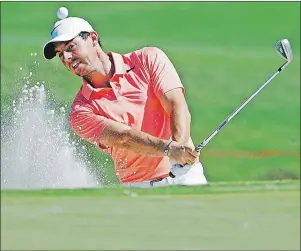  ?? AP PHOTO ?? Rory McIlroy hits from a sand trap on the 11th hole during a practice round for The Players Championsh­ip golf tournament Wednesday in Ponte Vedra Beach, Fla.