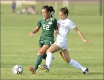  ?? STAN HUDY/THE SARATOGIAN ?? Shenendeho­wa sophomore midfielder Georgia Greene (22) looks to hold off Shaker senior midfielder Gabriela Daumont for a 5050 ball in the first half of Tuesday’s Suburban Council clash on the Shen campus.