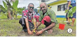  ?? ?? 2 2. Conua villagers celebrate the 2024 Internatio­nal Day of Forests by planting a tree.