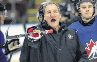  ?? CP PHOTO ?? Team Canada head coach Tim Hunter runs through drills during selection camp Tuesday in Victoria, B.C.