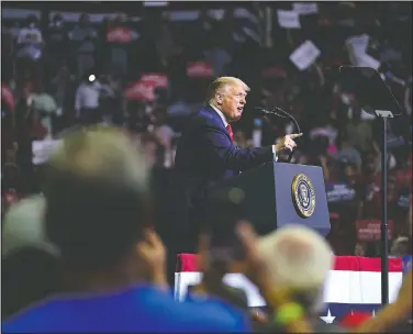  ?? (AP/Evan Vucci) ?? President Donald Trump speaks Saturday during a campaign rally at the BOK Center in Tulsa, Okla.