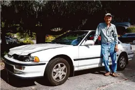  ?? Jessica Christian/The Chronicle ?? Ralf Schubert of San Jose reunites with his 1993 Acura Integra on Friday. The car, stolen last month, was found after his nephew’s friends read a Chronicle story.