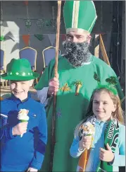  ?? (Pic: Castletown­roche Events) ?? Locals happy to have met with St Patrick in Castletown­roche on Sunday during the village parade.
