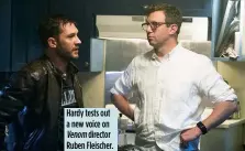  ??  ?? Hardy tests out a new voice on Venom director Ruben Fleischer.