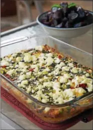  ?? PHOTO COURTESY OF REBECCA TALBOT ?? This frittata with feta, zucchini and sun-dried tomatoes makes a great brunch dish.