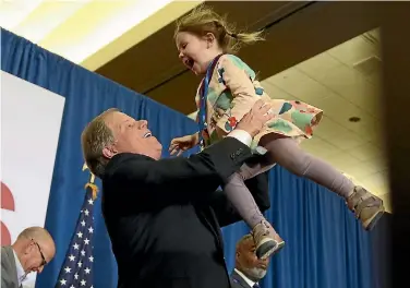  ?? PHOTO: AP ?? Democratic candidate for the US Senate Doug Jones celebrates during an election night party in Birmingham, Alabama.