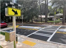  ?? Other AJC FILE ?? A crosswalk, used legally, should be a safe haven for commuters on foot. Drivers have dibs on every part of the road, and there typically are more of them than there are walkers and runners. Pedestrian­s also should show courtesy.