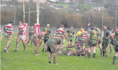  ?? Mike Atkinson ?? ●●Hooker Andy Broadhurst scores Stockport’s fifth try against St Benedict’s