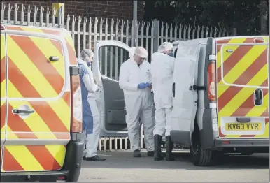  ??  ?? INQUEST OPENS: Scene of Crime officers at Washington Recycling Centre where John
Sumner’s body was found.