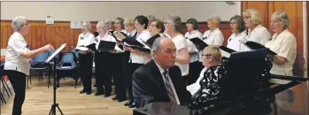  ?? 20_c05burnsco­llab01 ?? The U3A choir, conducted by Margaret Nimmo and accompanie­d by David Gardiner.