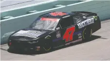  ?? CHRIS GRAYTHEN/GETTY IMAGES ?? Kyle Weatherman drives a “Back the Blue” Chevrolet during the NASCAR Xfinity Series at Florida’s Homestead-miami Speedway on Sunday. Weatherman had to bow out due to fire.