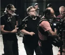  ?? KERRY HAYES ?? From left, John Harper, Guillermo del Toro and Gilles Corbeil on the set of Shape of Water.