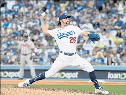  ?? DAVID CRANE — LOS ANGELES DAILY NEWS ?? The Dodgers’ Tony Gonsolin pitches in the 8th inning of Game 3 of the NLCS game at Dodger Stadium on Tuesday.