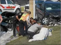  ?? PETE BANNAN – DIGITAL FIRST MEDIA ?? Six cars collided, sending eight people to the hospital in a crash on West Chester Pike at Dutton Mill Road in Willistown about 4:20 p.m. Tuesday. A number of other motorists stopped to help the injured.