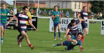  ?? Pic: Nick Schaschke ?? First blood Andy Wilson crashes over for Hamilton’s first try against Aberdeen.