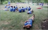  ?? NEWS-HERALD FILE ?? Cyclists participat­ing in the 2016 Journey of Hope crosscount­ry bicycle ride take a well-deserved break at the Lake Metroparks’ Chagrin River Park in Willoughby last year. The group stopped in Lake County again this year.