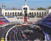  ?? ASHLEY LANDIS AP ?? Drivers participat­e in a practice session ahead of a NASCAR exhibition race at L.A. Memorial Coliseum.