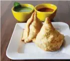  ??  ?? The simple, crisp vegetarian samosa is generously stuffed with a tasty, spicy potato filling.