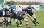  ??  ?? A Marist player prepares to take on Joe Lenton