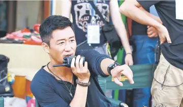  ??  ?? Wu Jing on the set of ‘Wolf Warriors 2’.