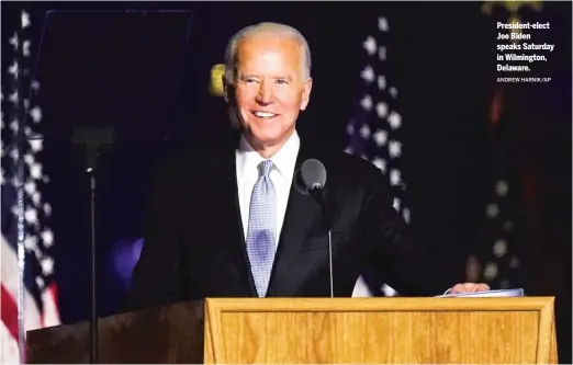  ?? ANDREW HARNIK/ AP ?? President- elect Joe Biden speaks Saturday in Wilmington, Delaware.