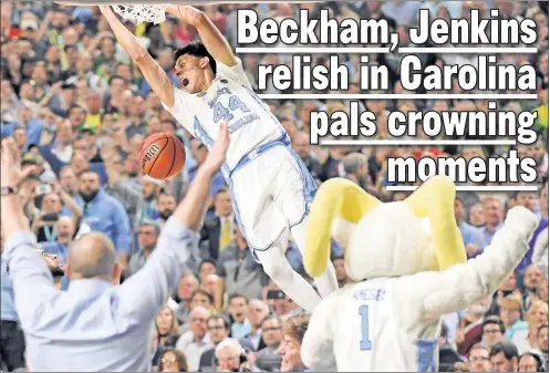  ?? USA TODAY Sports ?? FLYING HIGH: Isaiah Hicks dunks the ball against Josh Perkins during the final moments of North Carolina’s 71-65 victory over Gonzaga to win the Tar Heels’ sixth national championsh­ip on Monday night.