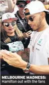  ??  ?? MELBOURNE MADNESS: Hamilton out with the fans