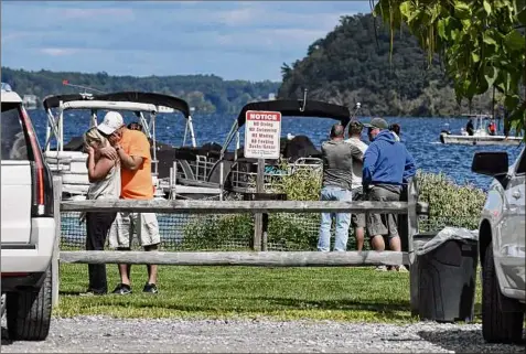  ?? Will Waldron / Times Union ?? A drowning victim from a canoe accident was recovered Sept. 1 near Brown’s Beach at Saratoga Lake.