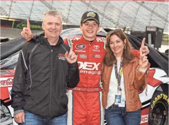  ?? JARED C. TILTON, GETTY IMAGES ?? Harrison Burton, center, has the support of parents Kim and Jeff, a former NASCAR driver.