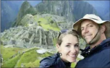  ?? MIKE AND ANNE HOWARD VIA AP ?? The couple on a trek to Machu Picchu in Peru. The Howards’ book, “Ultimate Journeys for Two: Extraordin­ary Destinatio­ns on Every Continent” grew out of their five-year adventure across seven continents as “the world’s longest honeymoone­rs,” an...