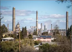  ?? ?? The Martinez Refining Co. showered nearby neighborho­ods in November with spent catalyst dust, a substance that contains metals, used in the refining process.