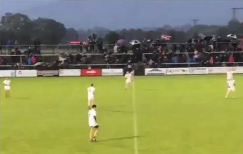  ??  ?? A screengrab of six Slaughtnei­l players enjoying splendid isolation around the half-way line during their Derry league clash against Magherafel­t