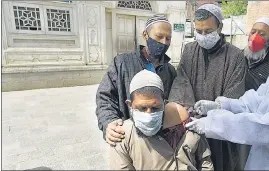  ?? WASEEM ANDRABI/HT PHOTO ?? A man receives a shot of a Covid-19 vaccine in Srinagar on Wednesday.