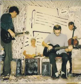  ?? Michael Dare ?? JONATHAN GOLD, right, on cello, plays in Guitar Army with Robert Lloyd, left, an unidentifi­ed guitarist and Joe Berardi, in a Polaroid that was later drawn on.