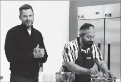  ?? ?? Joel McHale and contestant T in “Crime Scene Kitchen”